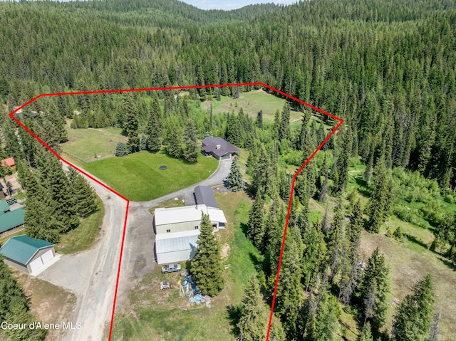 435 Shady Pines Loop, Priest Lake, ID 83856 - aerial view of property and surrounding area featuring a heavily wooded area and property parcel outlined