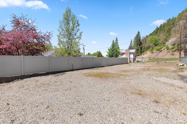 view of yard with fence