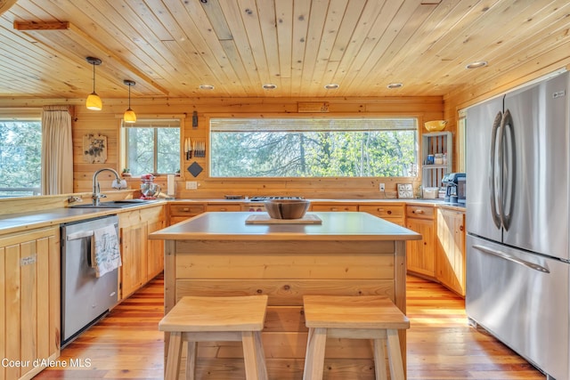 3226 District Two Rd, Bonners Ferry, ID 83805 - kitchen with appliances with stainless steel finishes, a sink, light wood-type flooring, light brown cabinetry, and wood ceiling
