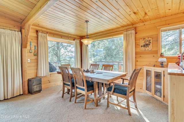 3226 District Two Rd, Bonners Ferry, ID 83805 - dining area with carpet flooring, wooden ceiling, and wooden walls