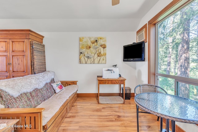 3226 District Two Rd, Bonners Ferry, ID 83805 - living area with baseboards, light wood-style flooring, and a ceiling fan