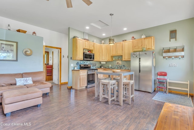 3226 District Two Rd, Bonners Ferry, ID 83805 - kitchen with appliances with stainless steel finishes, light brown cabinetry, dark wood-style flooring, light countertops, and recessed lighting