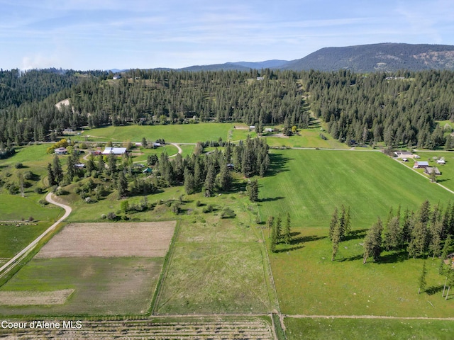 3226 District Two Rd, Bonners Ferry, ID 83805 - aerial view featuring a mountain view, a rural view, and a view of trees