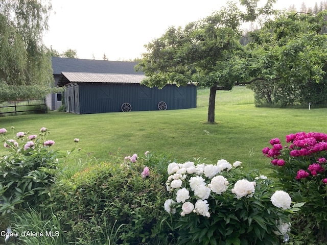 3226 District Two Rd, Bonners Ferry, ID 83805 - view of yard featuring an outbuilding and fence