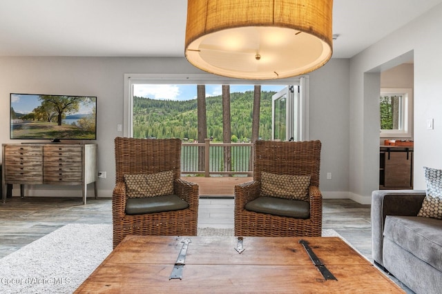 130 Cedar Shls, Sagle, ID 83860 - sitting room featuring wood finished floors, healthy amount of natural light, and baseboards