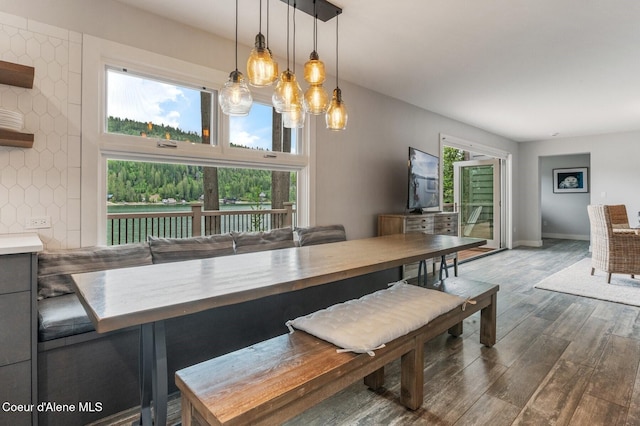 130 Cedar Shls, Sagle, ID 83860 - dining area with healthy amount of natural light, wood finished floors, and baseboards