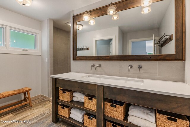 130 Cedar Shls, Sagle, ID 83860 - full bath featuring wood finished floors, vanity, and baseboards