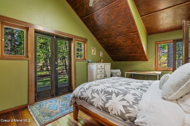 395 Kiebert, Hope, ID 83836 - bedroom featuring wood finished floors, access to exterior, vaulted ceiling, and baseboards