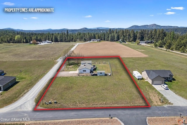 29 Silver Mountain Ln, Oldtown, ID 83822 - aerial view of sparsely populated area featuring a mountain backdrop and property parcel outlined