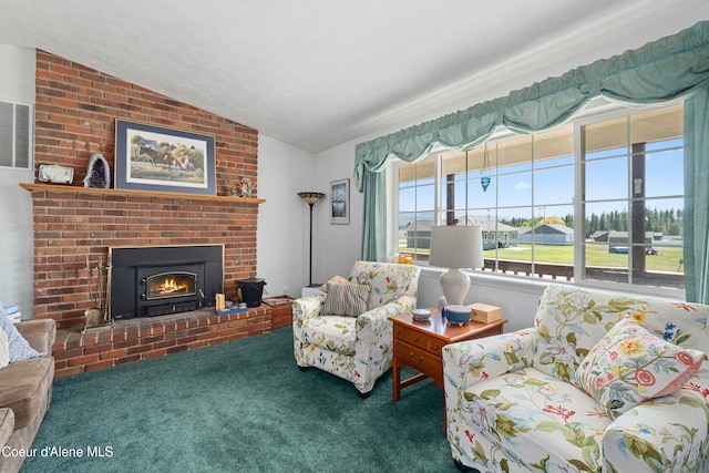29 Silver Mountain Ln, Oldtown, ID 83822 - carpeted living area with vaulted ceiling and a brick fireplace