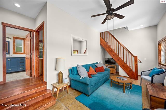 24010 N Bridge Lake Rd, Rathdrum, ID 83858 - living area with stairway, ceiling fan, tile patterned floors, and recessed lighting