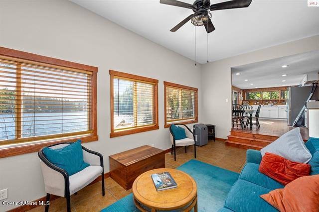 24010 N Bridge Lake Rd, Rathdrum, ID 83858 - tiled living room featuring ceiling fan and recessed lighting