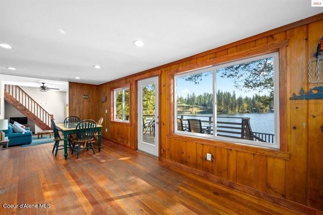 24010 N Bridge Lake Rd, Rathdrum, ID 83858 - dining area featuring hardwood / wood-style flooring, wood walls, recessed lighting, and a ceiling fan