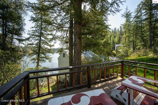 24010 N Bridge Lake Rd, Rathdrum, ID 83858 - view of wooden balcony with a deck