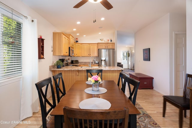 dining area featuring light wood-style flooring, a ceiling fan, and recessed lighting