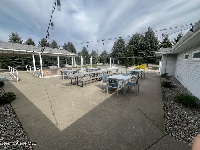view of patio featuring outdoor dining space