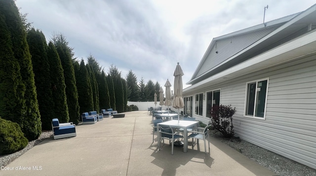 view of patio featuring outdoor lounge area and outdoor dining area