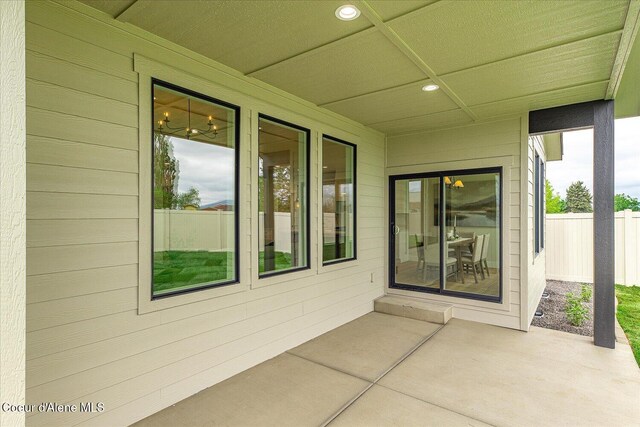 view of patio / terrace featuring fence