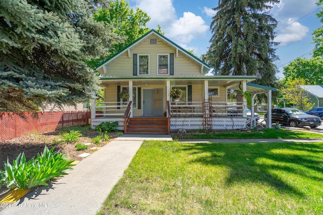 610 W Emma Ave, Coeur Dalene, ID 83814 - view of front of house with a porch and a front yard
