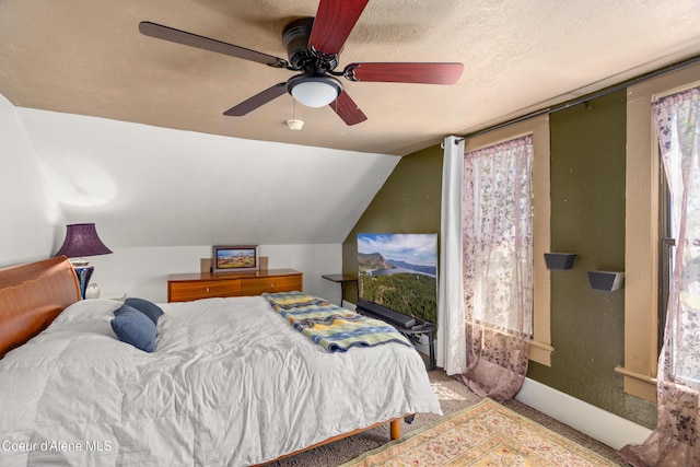 610 W Emma Ave, Coeur Dalene, ID 83814 - bedroom with carpet flooring, lofted ceiling, ceiling fan, and baseboards