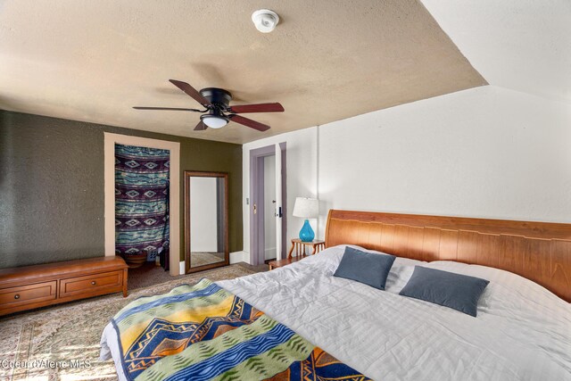 610 W Emma Ave, Coeur Dalene, ID 83814 - bedroom with a textured ceiling and ceiling fan