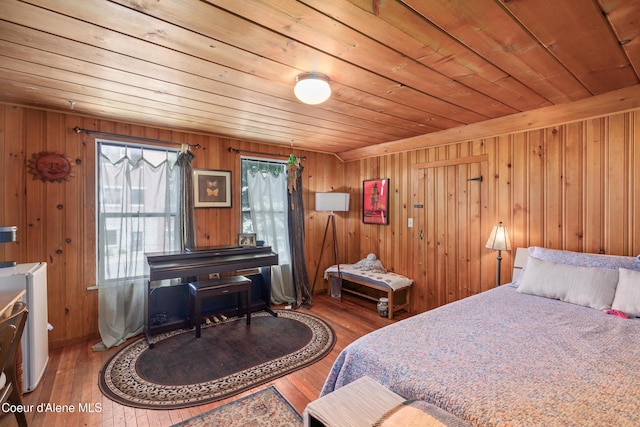 610 W Emma Ave, Coeur Dalene, ID 83814 - bedroom featuring wood ceiling, wood finished floors, and wooden walls