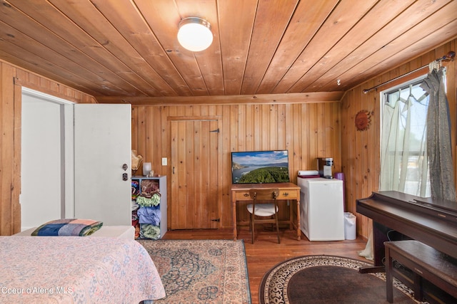 610 W Emma Ave, Coeur Dalene, ID 83814 - bedroom with wooden ceiling, wood finished floors, and wood walls