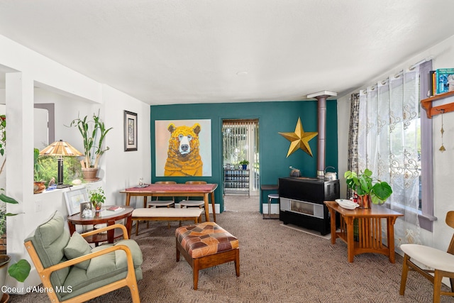 610 W Emma Ave, Coeur Dalene, ID 83814 - sitting room featuring plenty of natural light and carpet flooring