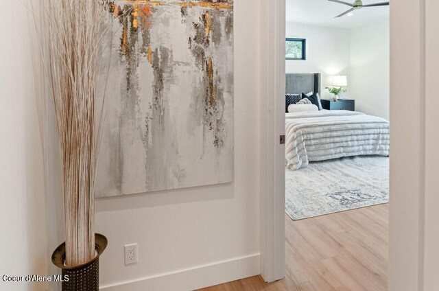 624 Satchel Dr, Spirit Lake, ID 83869 - bedroom view of wood finished floors and baseboards