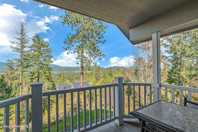 9798 N Willowherb Ct, Hauser, ID 83854 - balcony featuring a mountain view
