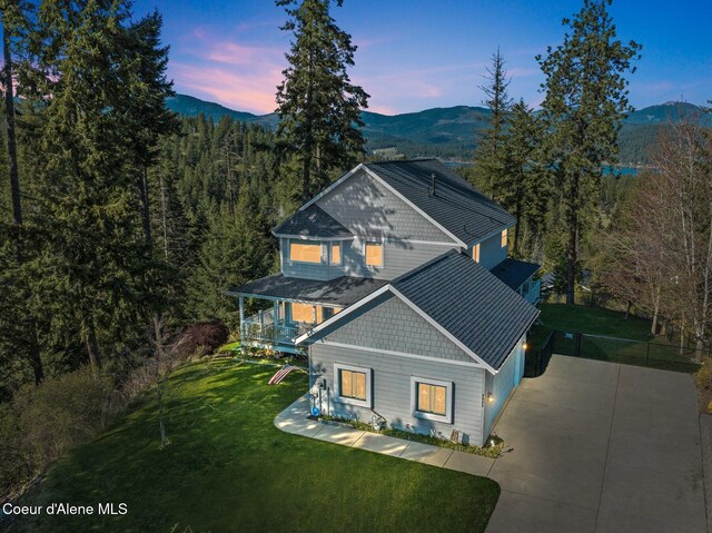 9798 N Willowherb Ct, Hauser, ID 83854 - aerial view at dusk of a mountain view