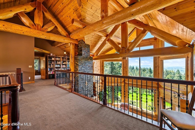 1050 Greenview Ln, Moscow, ID 83843 - hallway featuring healthy amount of natural light, beamed ceiling, wooden ceiling, high vaulted ceiling, and carpet flooring