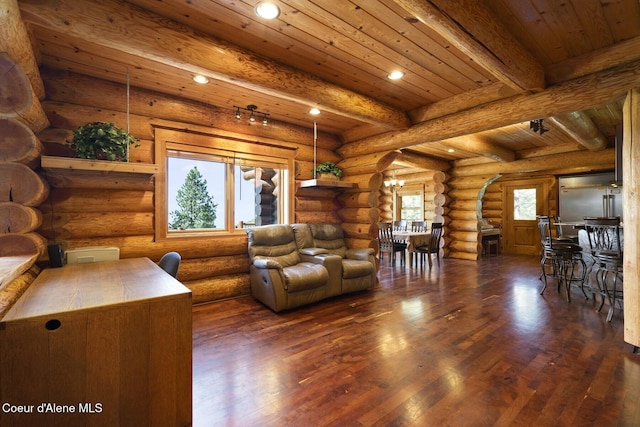 1050 Greenview Ln, Moscow, ID 83843 - living area with recessed lighting, beam ceiling, wood finished floors, arched walkways, and wood ceiling