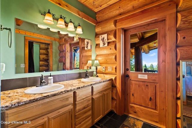 1050 Greenview Ln, Moscow, ID 83843 - full bathroom featuring log walls, double vanity, and tile patterned flooring