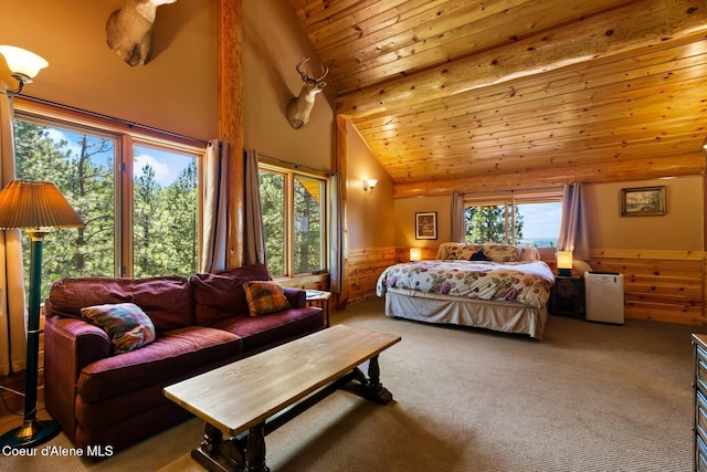 1050 Greenview Ln, Moscow, ID 83843 - bedroom featuring carpet, wainscoting, wood ceiling, high vaulted ceiling, and wood walls