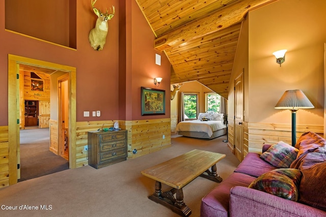 1050 Greenview Ln, Moscow, ID 83843 - carpeted bedroom featuring wainscoting, wooden walls, wooden ceiling, beamed ceiling, and high vaulted ceiling