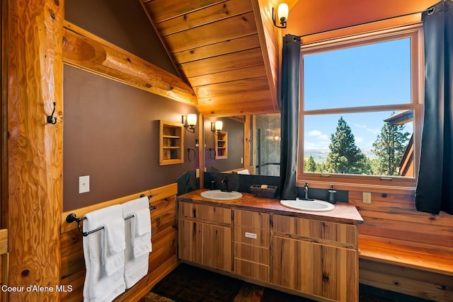 1050 Greenview Ln, Moscow, ID 83843 - full bathroom with double vanity, vaulted ceiling, wooden ceiling, and wooden walls