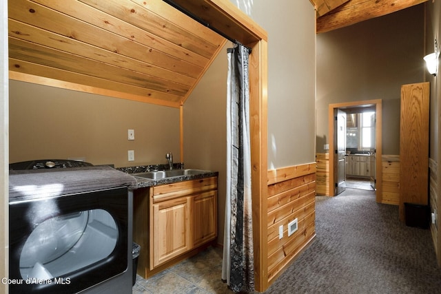 1050 Greenview Ln, Moscow, ID 83843 - washroom featuring washer / clothes dryer, wood ceiling, cabinet space, carpet, and wainscoting