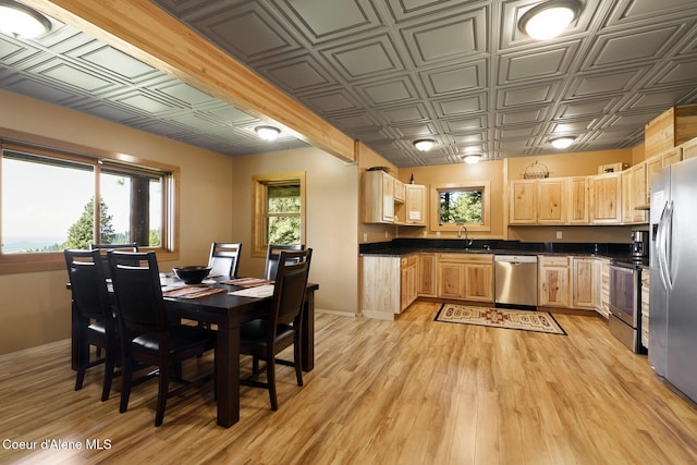1050 Greenview Ln, Moscow, ID 83843 - dining area with an ornate ceiling, baseboards, and light wood-type flooring