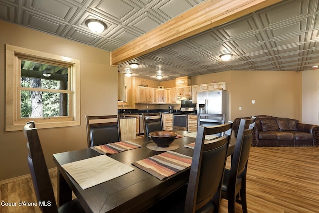 1050 Greenview Ln, Moscow, ID 83843 - dining area featuring an ornate ceiling, wood finished floors, and baseboards