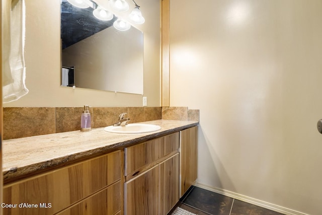 1050 Greenview Ln, Moscow, ID 83843 - bathroom with tile patterned floors, vanity, and baseboards