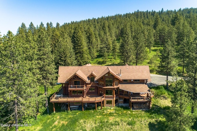 1050 Greenview Ln, Moscow, ID 83843 - rear view of property with a view of trees and a deck