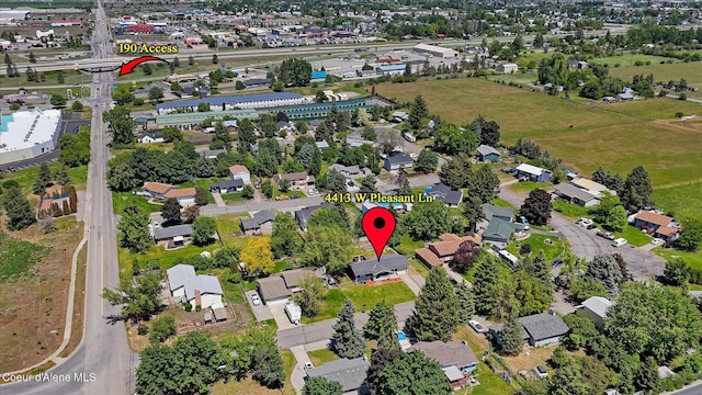 4413 W Pleasant Ln, Post Falls, ID 83854 - aerial view of property and surrounding area with nearby suburban area