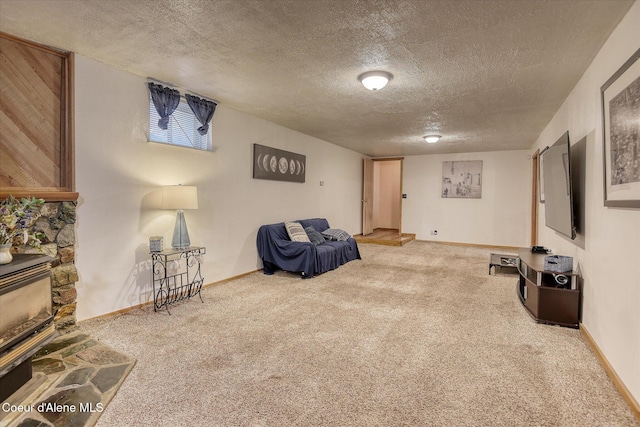 4413 W Pleasant Ln, Post Falls, ID 83854 - sitting room featuring carpet floors, a textured ceiling, and baseboards