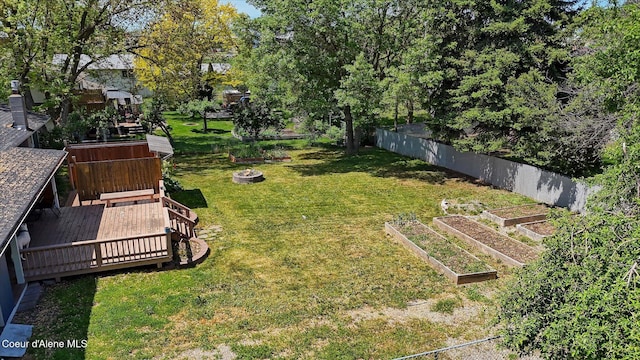 4413 W Pleasant Ln, Post Falls, ID 83854 - view of yard with a garden and a deck