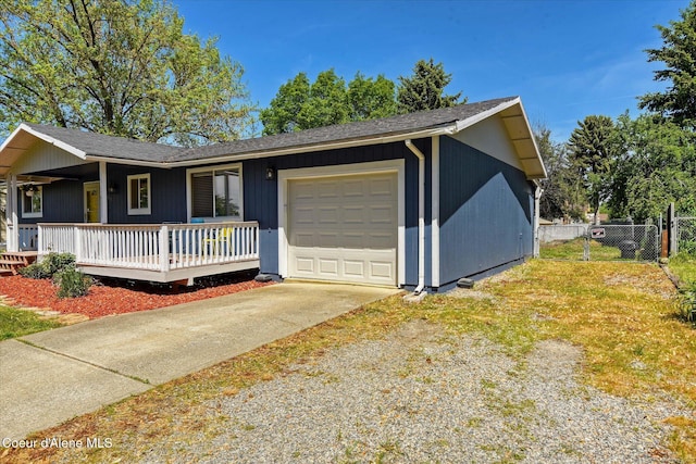 4413 W Pleasant Ln, Post Falls, ID 83854 - ranch-style house with driveway, a garage, covered porch, and a shingled roof