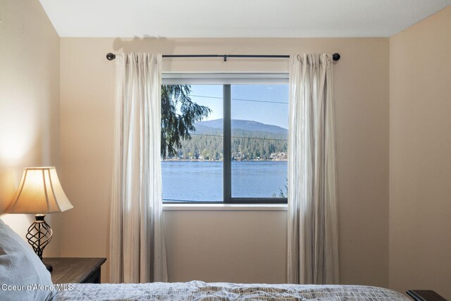 11624 N W Newman Lake Dr, Newman Lake, WA 99025 - bedroom featuring a mountain view