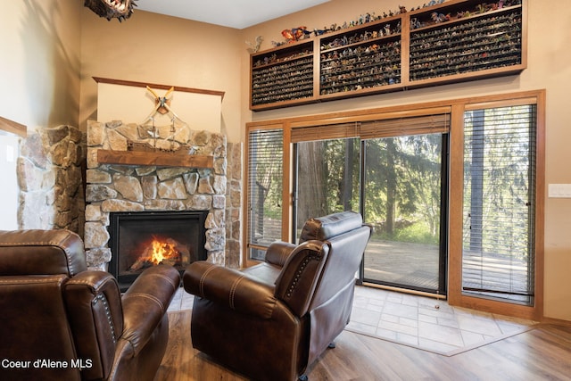 11624 N W Newman Lake Dr, Newman Lake, WA 99025 - living room with a stone fireplace and wood finished floors