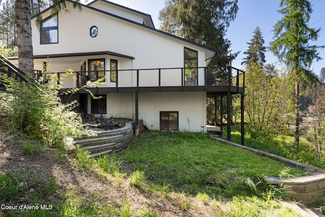 11624 N W Newman Lake Dr, Newman Lake, WA 99025 - rear view of house featuring a deck and a yard