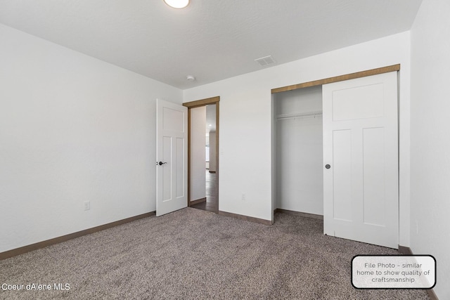 LT6BLK1 E Valley St, Oldtown, ID 83822 - unfurnished bedroom featuring carpet flooring, baseboards, and a closet